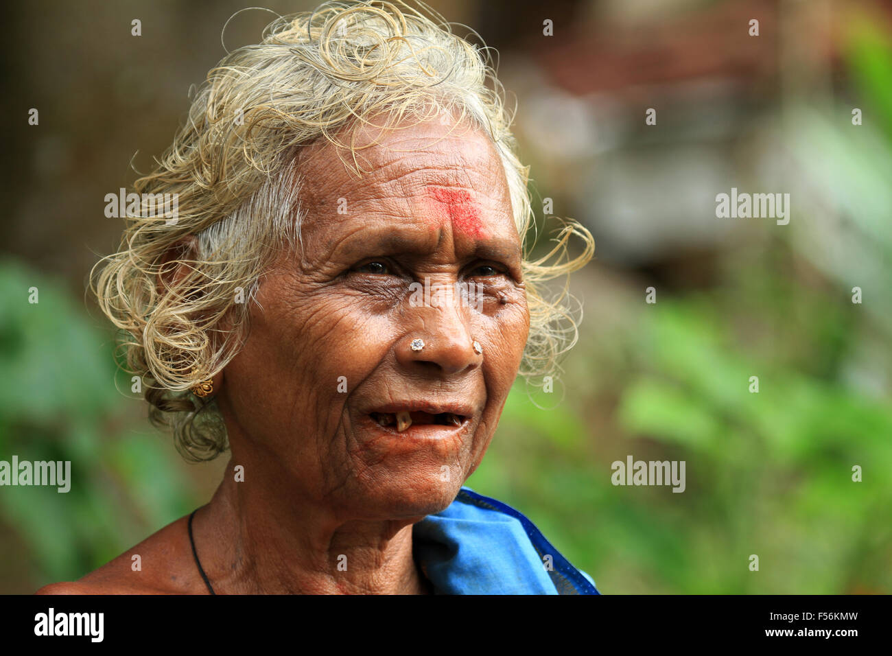 Old Tamil lady with traditional dress Stock Photo