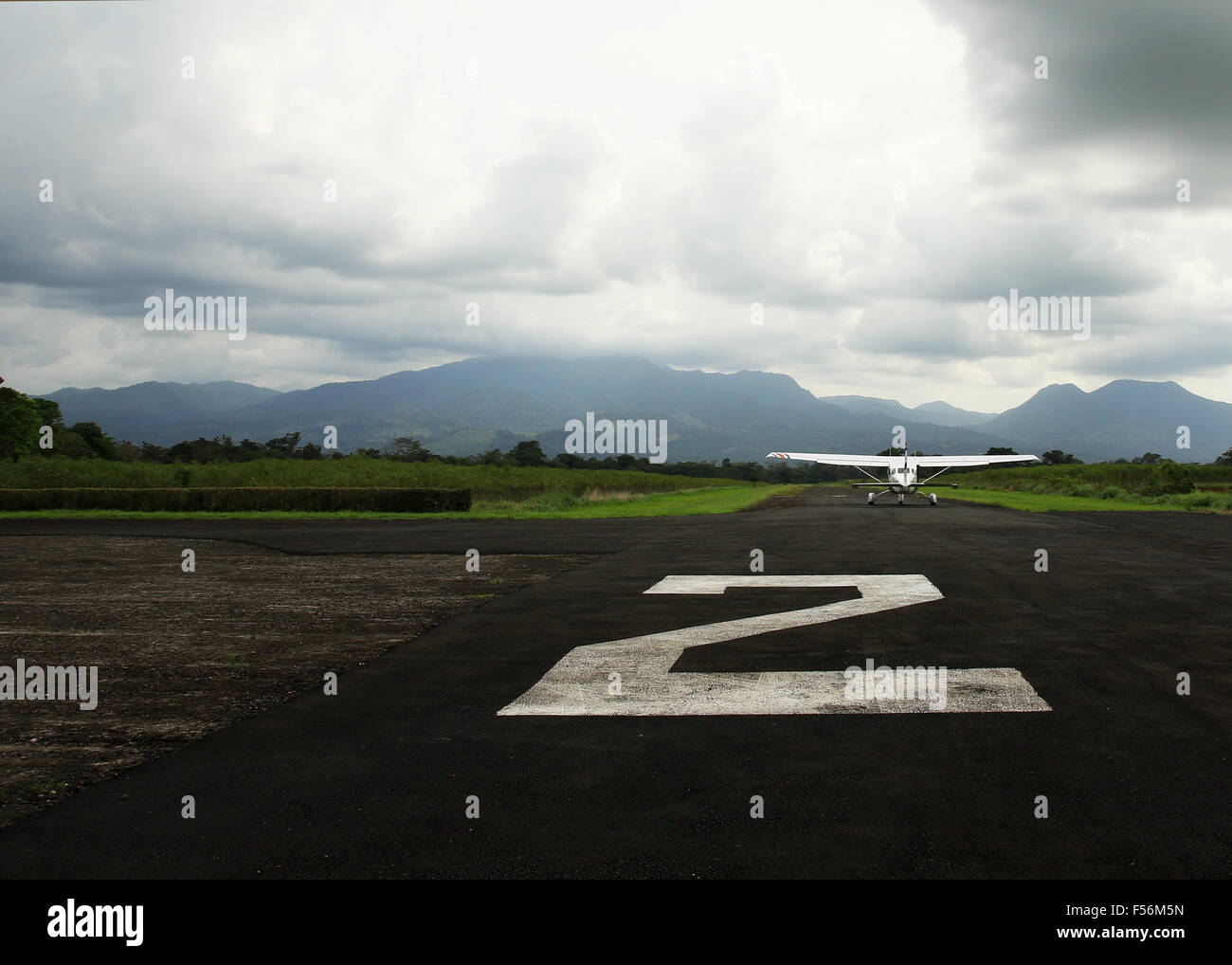 Small plane landing after traveling from San Jose to the La Fortuna airport in Costa Rica Stock Photo