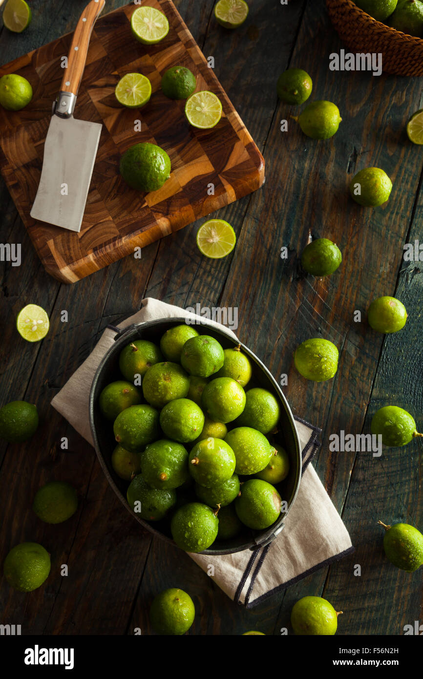 Raw Green Organic Key Limes in a Bowl Stock Photo Alamy