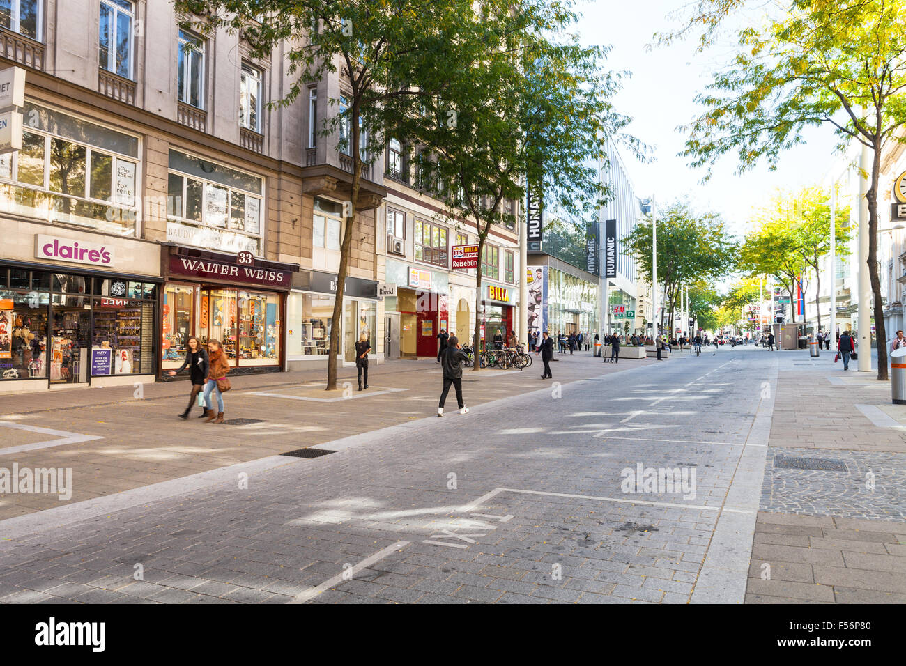 VIENNA, AUSTRIA - OCTOBER 1, 2015: people on pedestrian area of Mariahilferstrasse street in Vienna. Mariahilfer Strasse is the Stock Photo