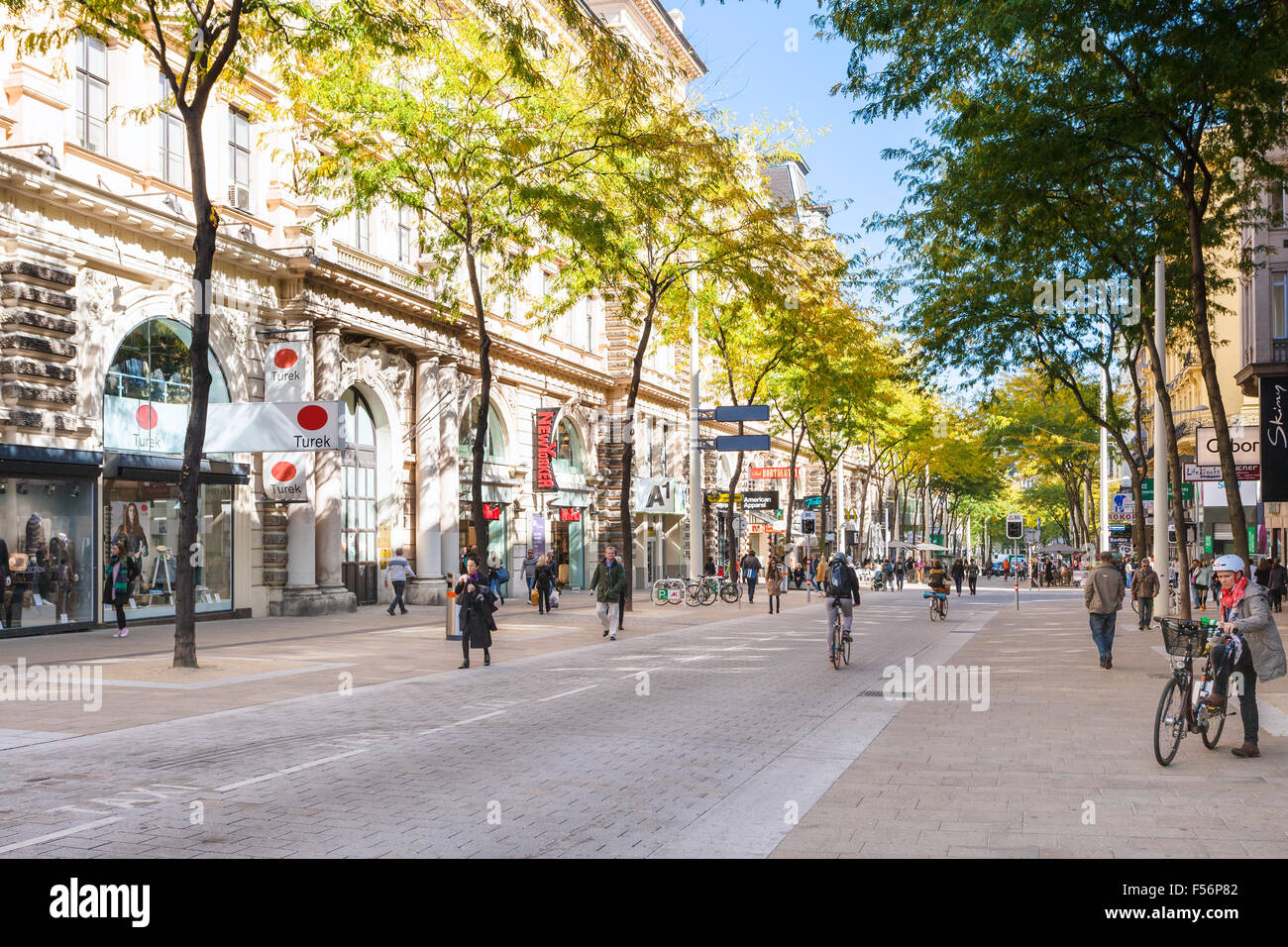 VIENNA, AUSTRIA - OCTOBER 1, 2015: people and shops on Mariahilferstrasse street in Vienna. Mariahilfer Strasse is the largest a Stock Photo