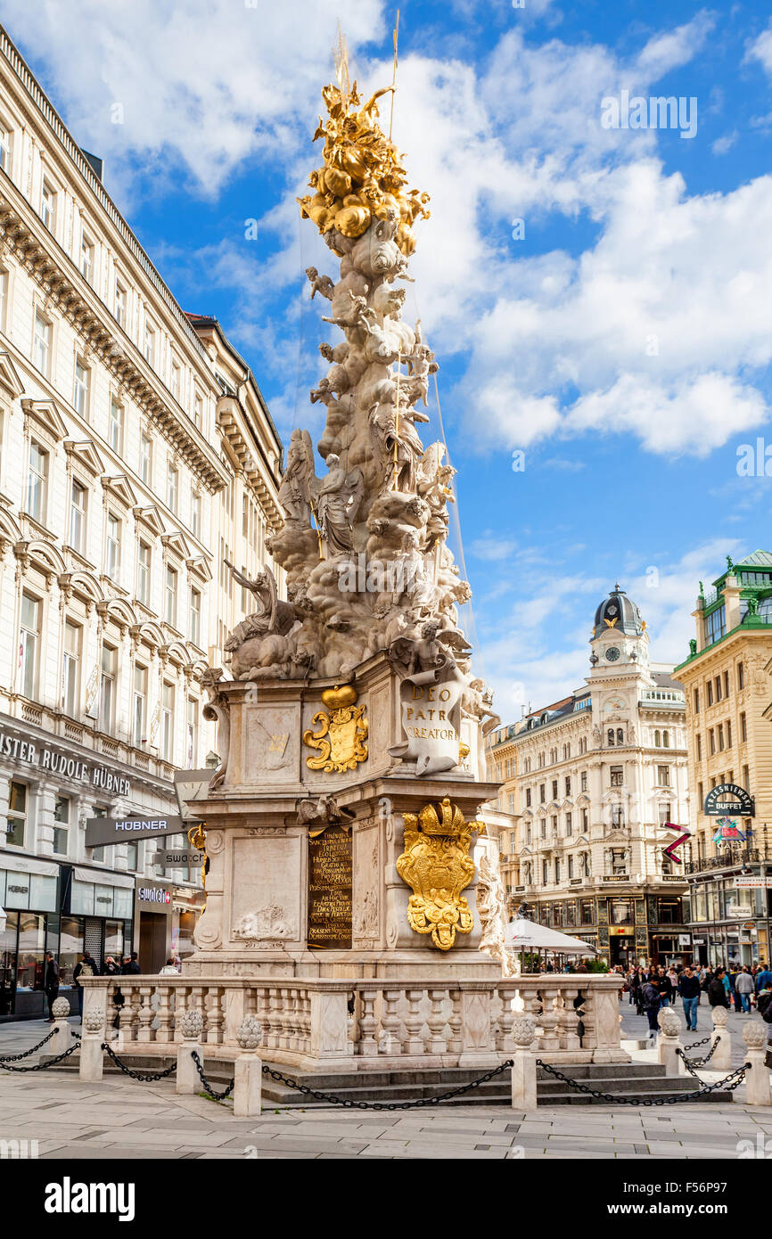 VIENNA, AUSTRIA - SEPTEMBER 27, 2015: memorial Plague column (Pestsaule) and tourists on Graben street Vienna. The Graben is one Stock Photo