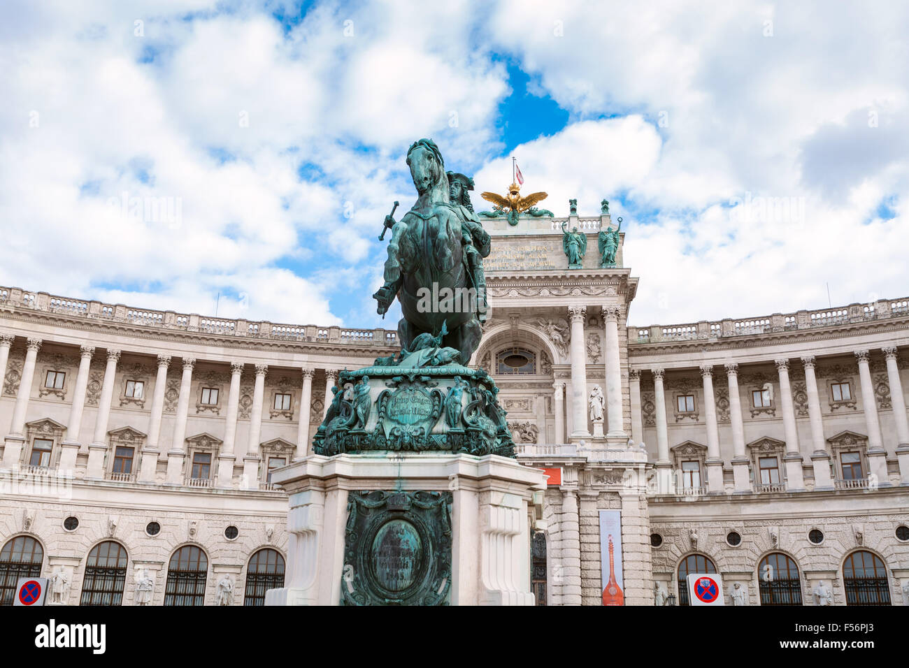 VIENNA, AUSTRIA - SEPTEMBER 27, 2015: statue Prince Eugene of Savoy and facade of Neue Burg in Hofburg. New Castle wing today ho Stock Photo