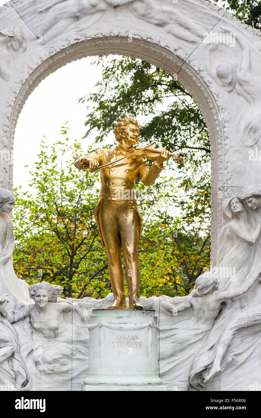 travel to Vienna city - gilded bronze monument of 'Waltz King' Johann Strauss son in Stadtpark (City Park) Vienna, Austria Stock Photo