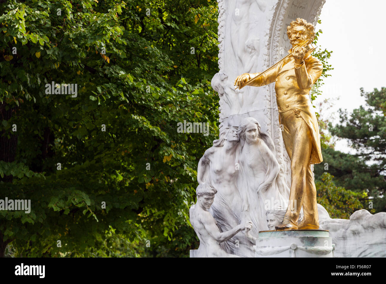 travel to Vienna city - gilded bronze statue 'Waltz King' Johann Strauss son in Stadtpark (City Park), Vienna, Austria Stock Photo