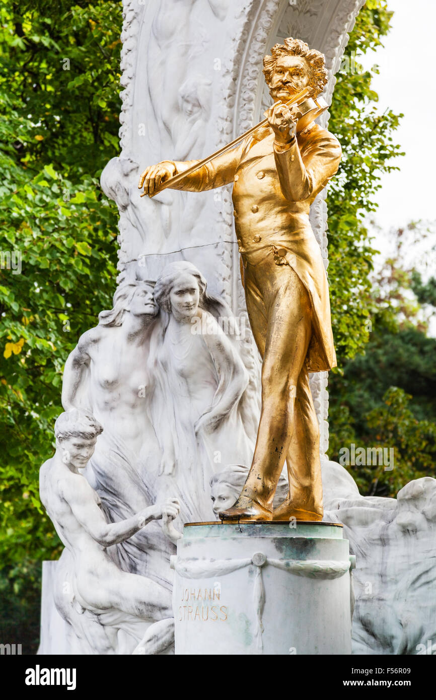 travel to Vienna city - golden statue 'Waltz King' Johann Strauss son in Stadtpark (City Park) Vienna, Austria Stock Photo