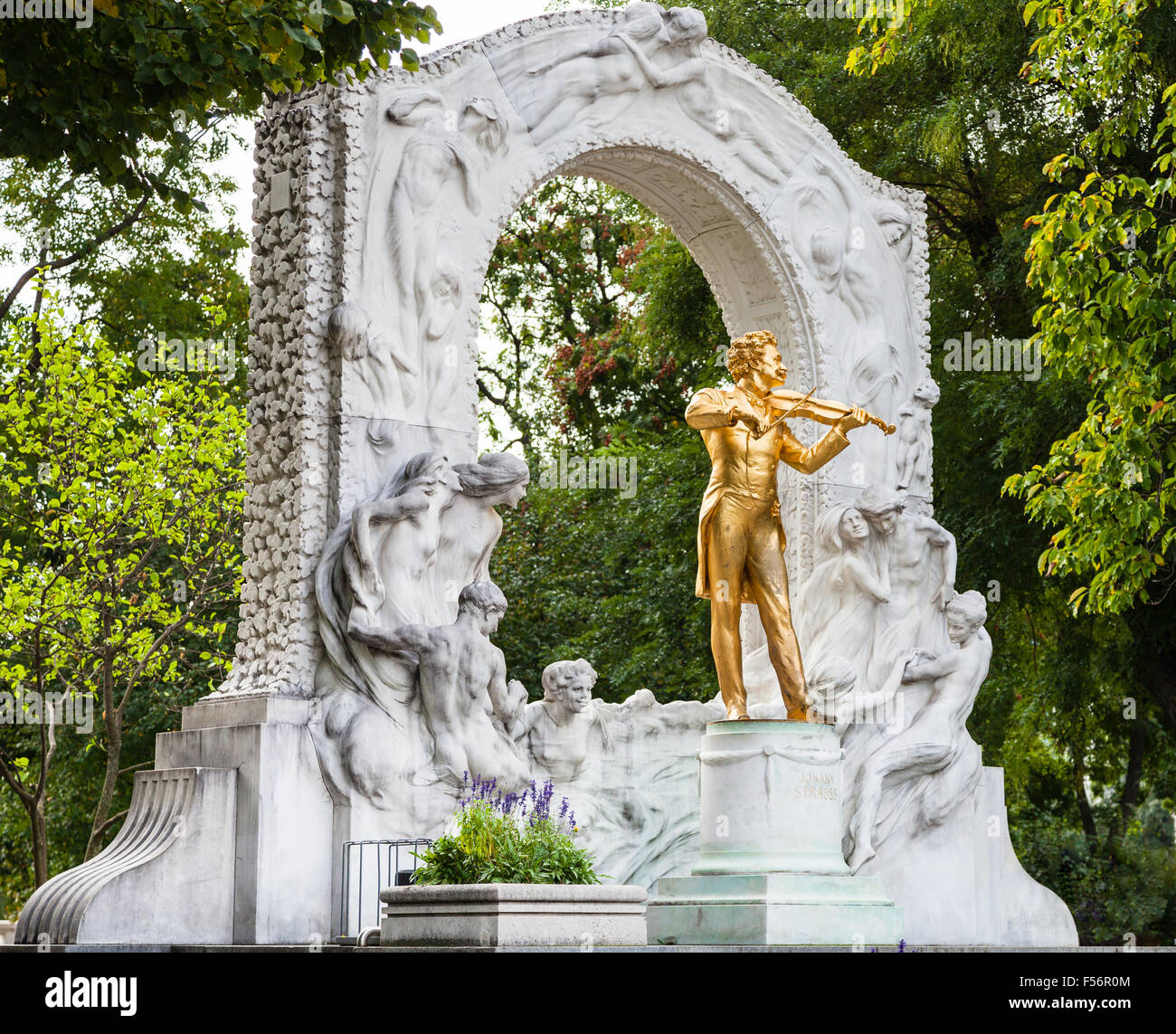 travel to Vienna city - golden monument of 'Waltz King' Johann Strauss son in Stadtpark (City Park) Vienna, Austria Stock Photo