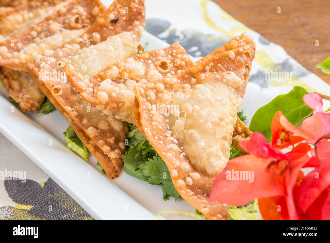 Pork, shrimp and vegetables deep fried in wonton wrappers Stock Photo