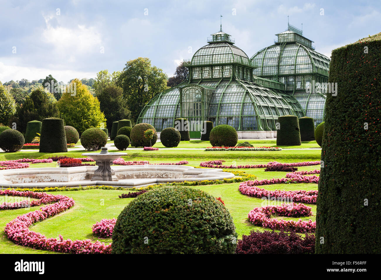 travel to Vienna city - Palmenhaus pavilion, large greenhouse in garden of Schloss Schonbrunn palace, Vienna, Austria Stock Photo
