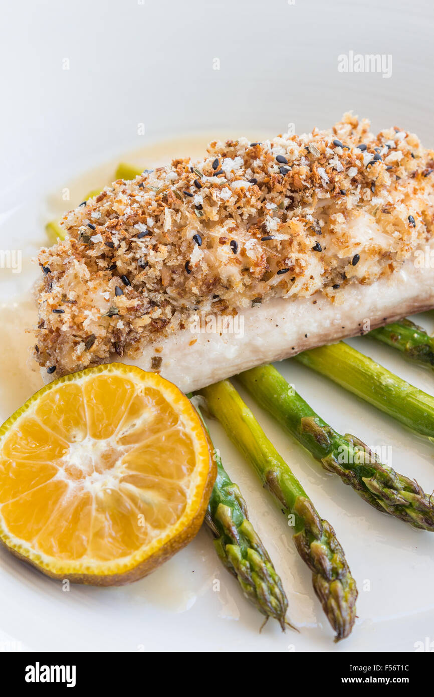Crab and pumpkin crusted Mahi Mahi with asparagus and Calamansi butter