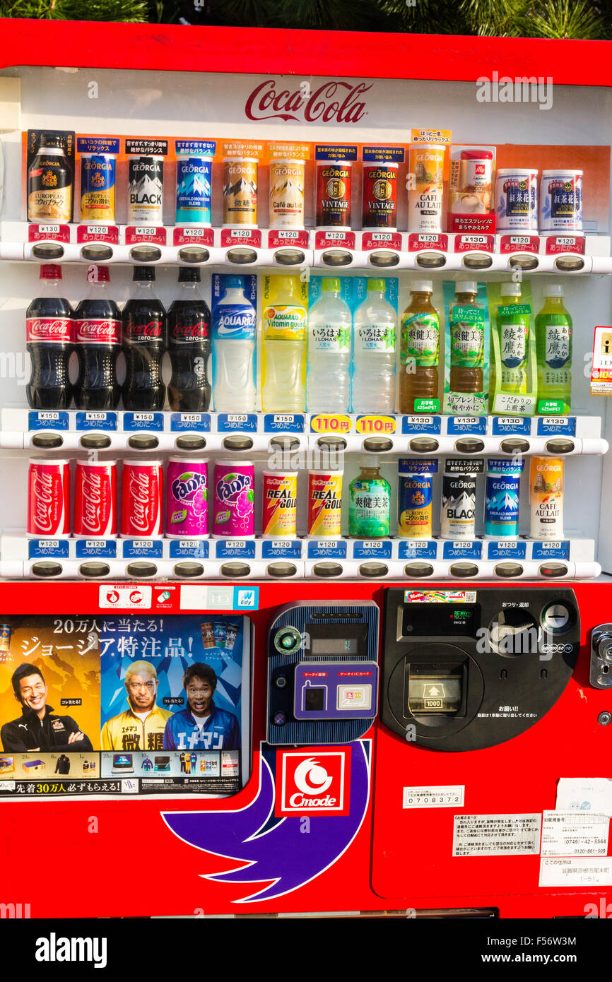 Japan, Hikone. Japanese vending machine. Red, CocaCola. Three rows