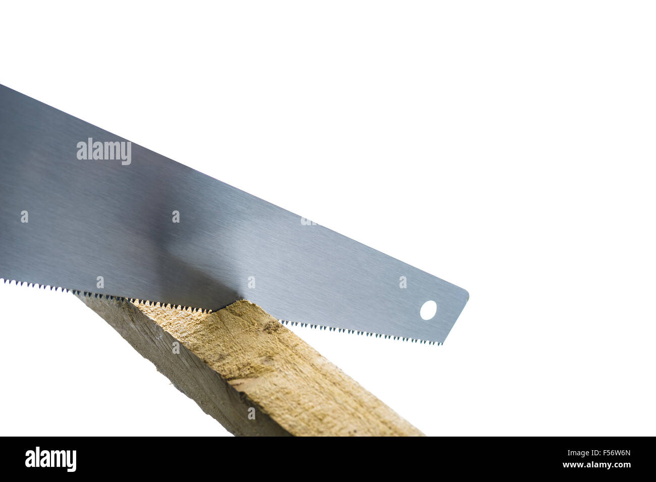 Hand saw cutting some timber. Stock Photo