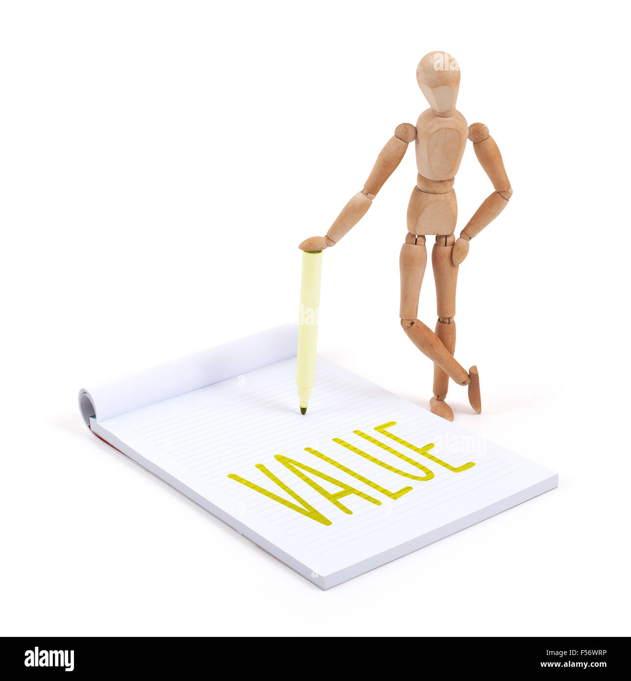 Wooden mannequin writing in a scrapbook Value Stock Photo Alamy
