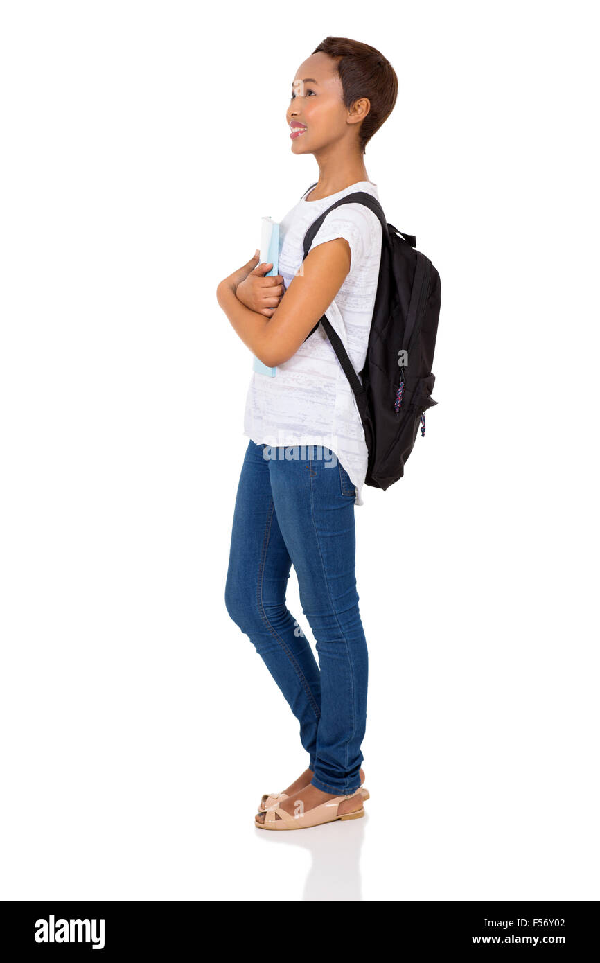 side view of young African college student looking up isolated on white Stock Photo