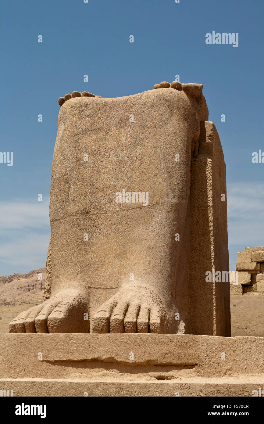 Base of seated statue at the Ramesseum, Mortuary Temple of Ramesses II on West Bank of the Nile at Luxor, Egypt Stock Photo