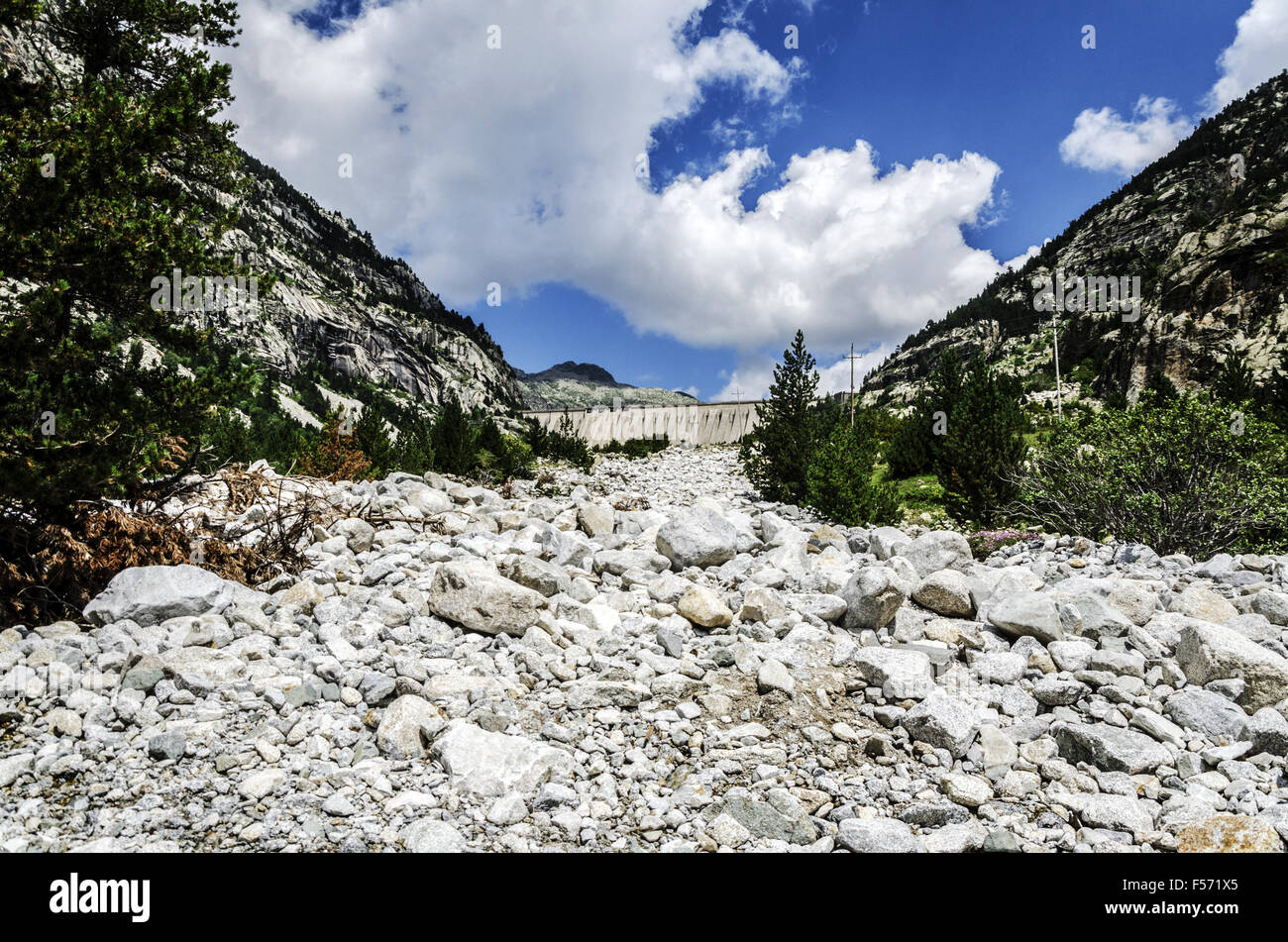 Dry out river in the Pyrenees mountains, thre is no even a drop of water. Stock Photo