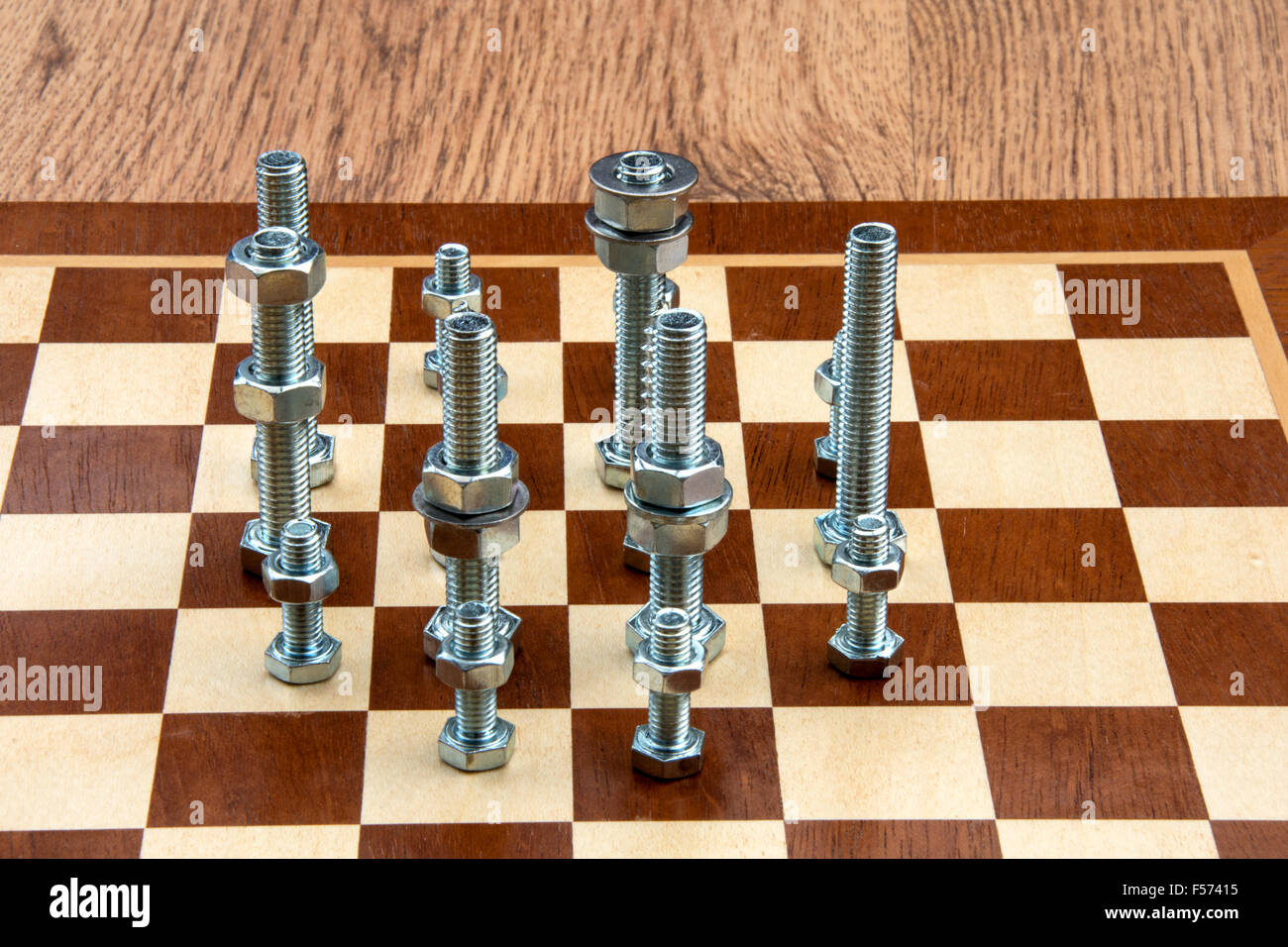 Chess set made from nuts and bolts with the pieces displayed in the