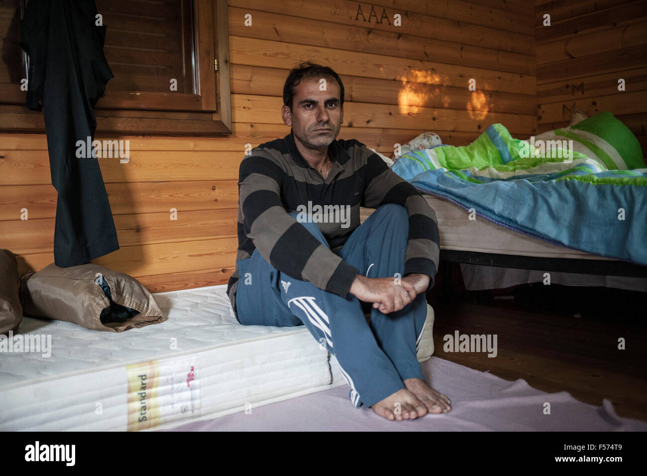 Ahmad Nazad, a 36 years old refugee from Syria, inside Pikpa camp, near the Airport at Mytilene, Lesvos, where volunteers organize a village for traumatized refugees, on the 28th of October 2015. Ahmad lost three of his four children while crossing from the Turkish border to Lesbos, Greece, in a wooden boat. Their boat was hit by a boat of the Greek coast guard and sank. Photo: Socrates Baltagiannis/dpa Stock Photo