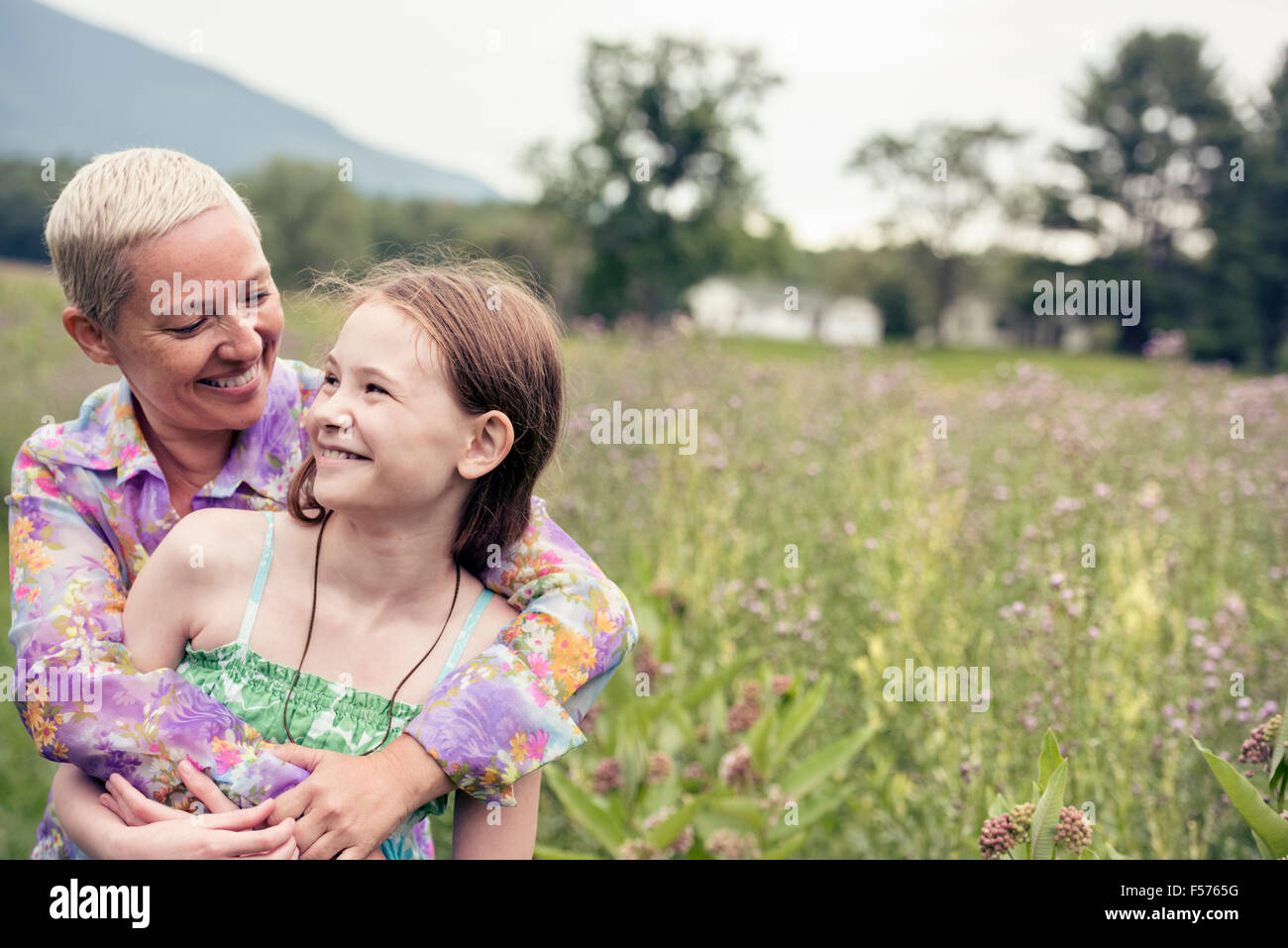 mature-woman-and-young-girls