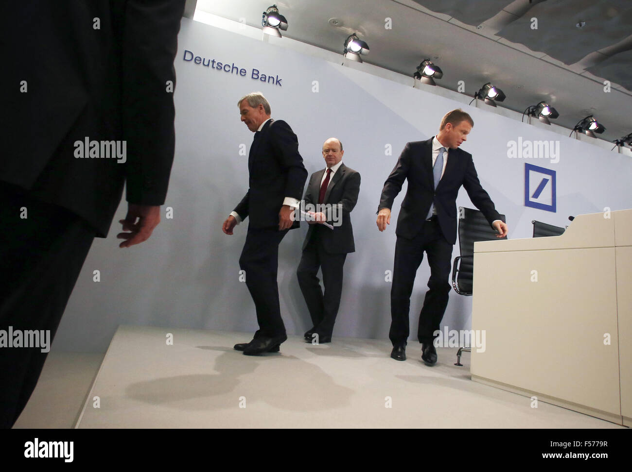 Christian Sewing (R-L), chief of the private and business client sector at the bank, and Juergen Fitschen and John Cryan, co-CEOS of Deutsche Bank, leave the podium after a press conference at the bank headquarters in Frankfurt am Main, Germany, 29 October 2015. The bank is presenting details on 'Strategy 2020.' Photo: FREDRIK VON ERICHSEN/dpa Stock Photo