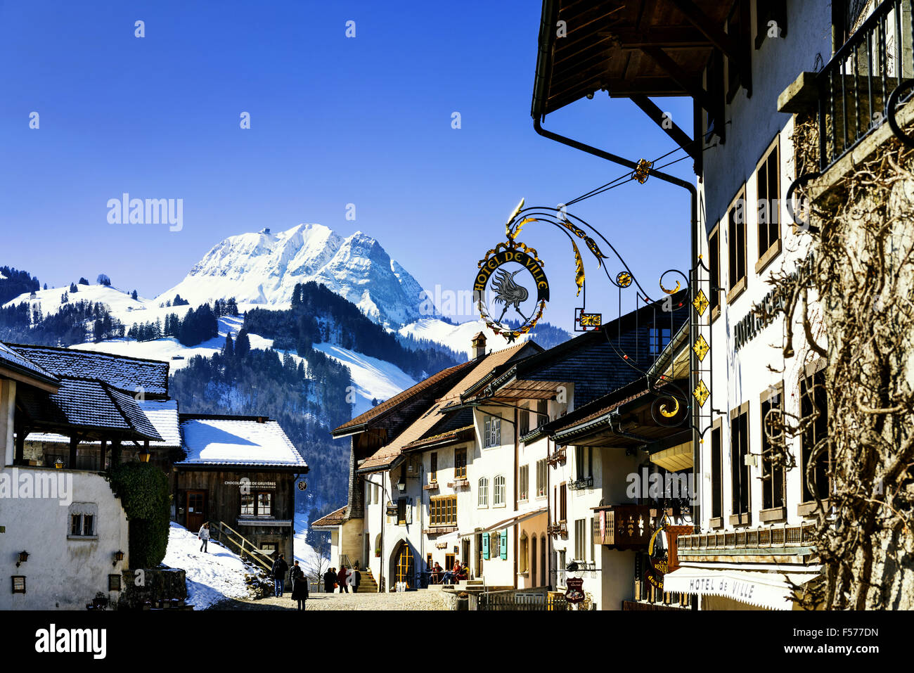 GRUYERES, SWITZERLAND - MARCH 03, 2015: View of the main street in the swiss village Gruyeres, Switzerland . The town and region Stock Photo