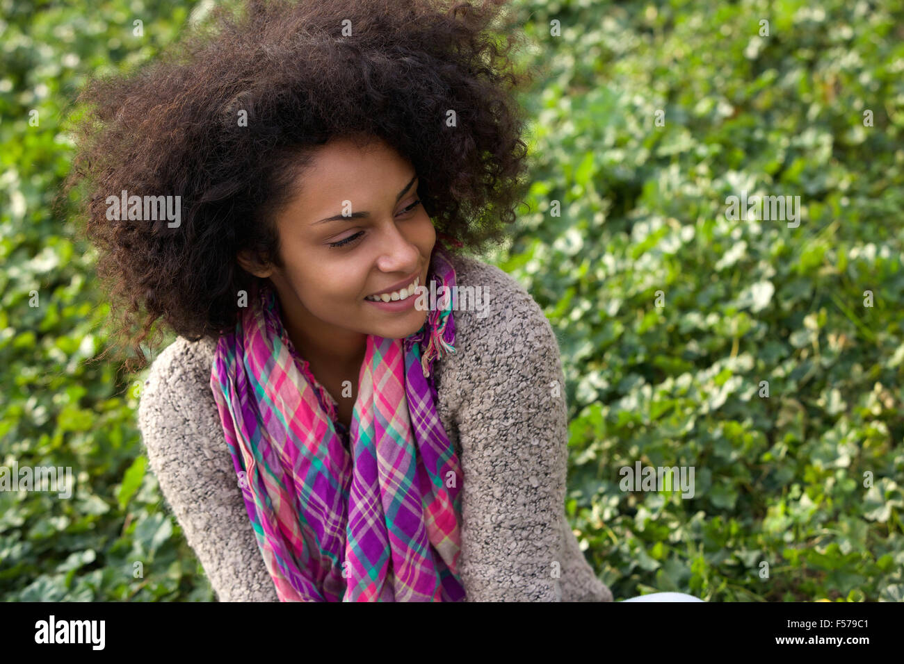 Close up portrait of a happy young african american woman smiling Stock ...