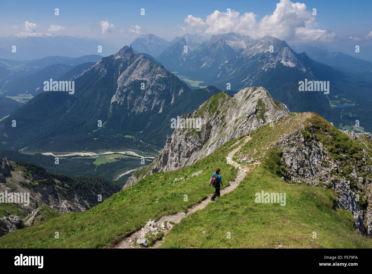Female hiker on section of Mittenwalder Höhenweg in Karwendel mountains, Mittenwald, Bavaria, Germany Stock Photo