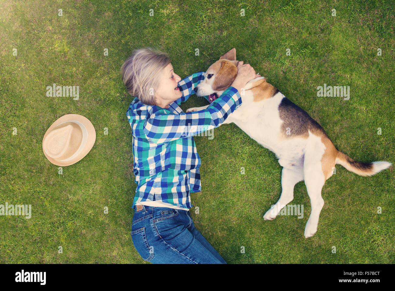 Senior woman with her dog Stock Photo