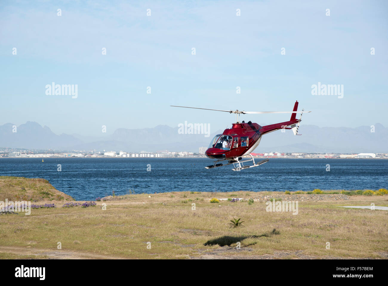 Helicopter flight with a backdrop of mountains close to Cape Town South Africa Stock Photo