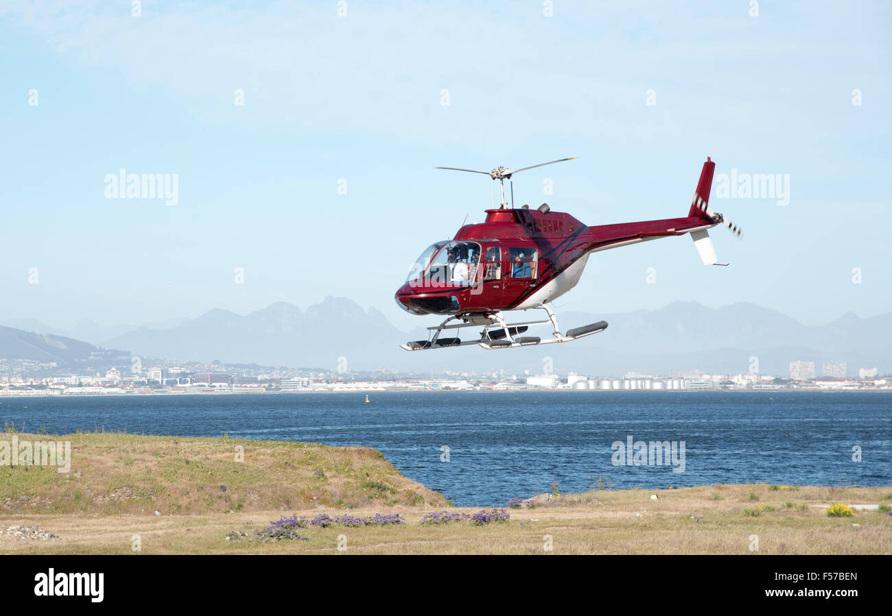 Helicopter flight with a backdrop of mountains close to Cape Town South Africa Stock Photo