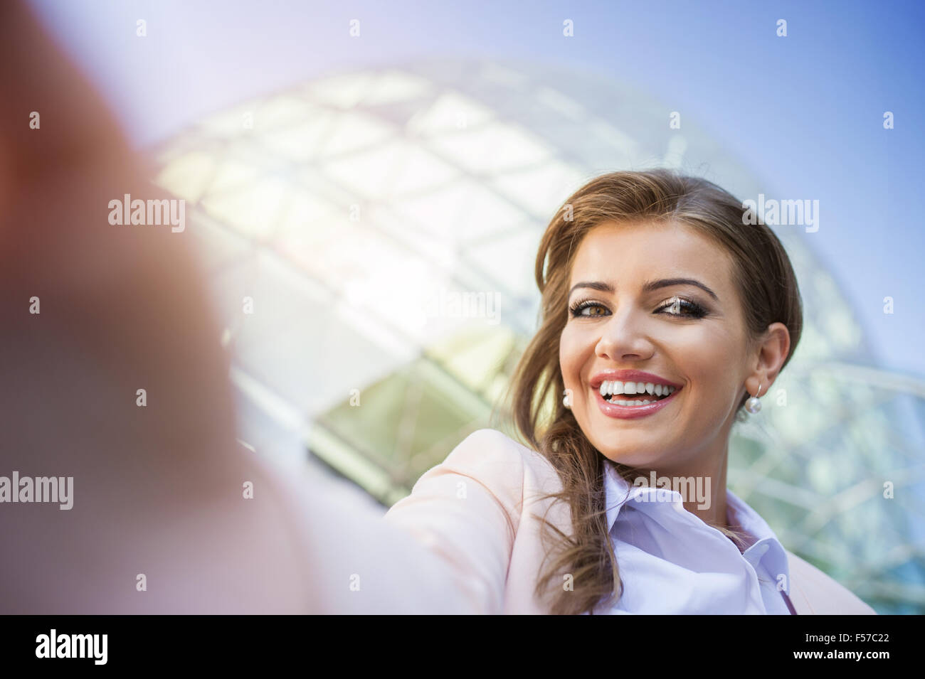 Beautiful young business woman Stock Photo - Alamy