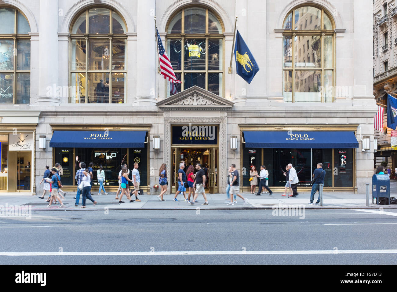People walk by Ralph Lauren's Fifth Avenue Polo store on April 4, News  Photo - Getty Images