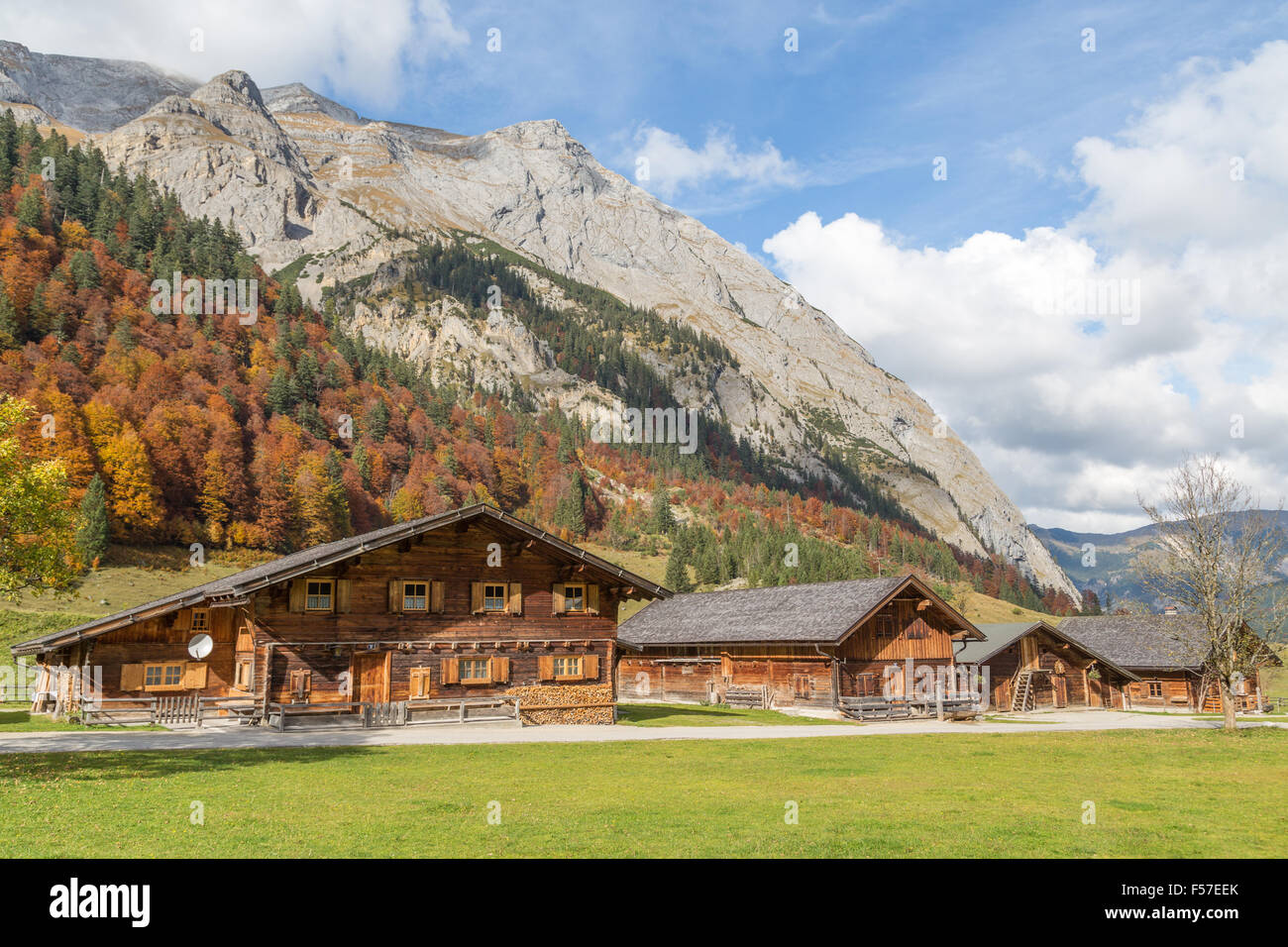 Almdorf Eng, huts in front of autumnal forest and mountain range, Eng ...