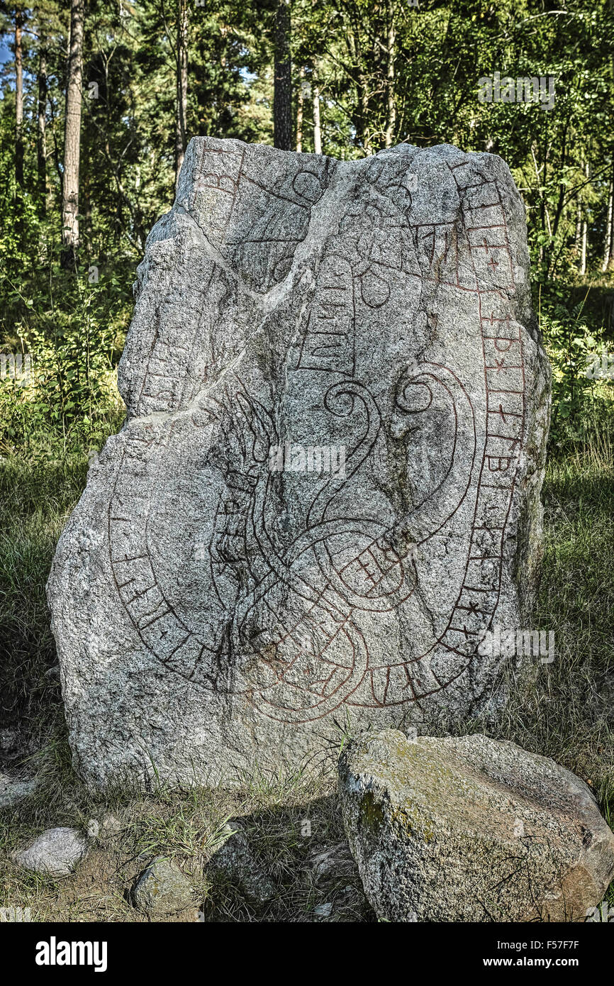 Runestone U74, Husby gård, Uppland, Sweden. Text: 'Bjôrn had this stone raised in memory of his brother...-steinn. May God and G Stock Photo