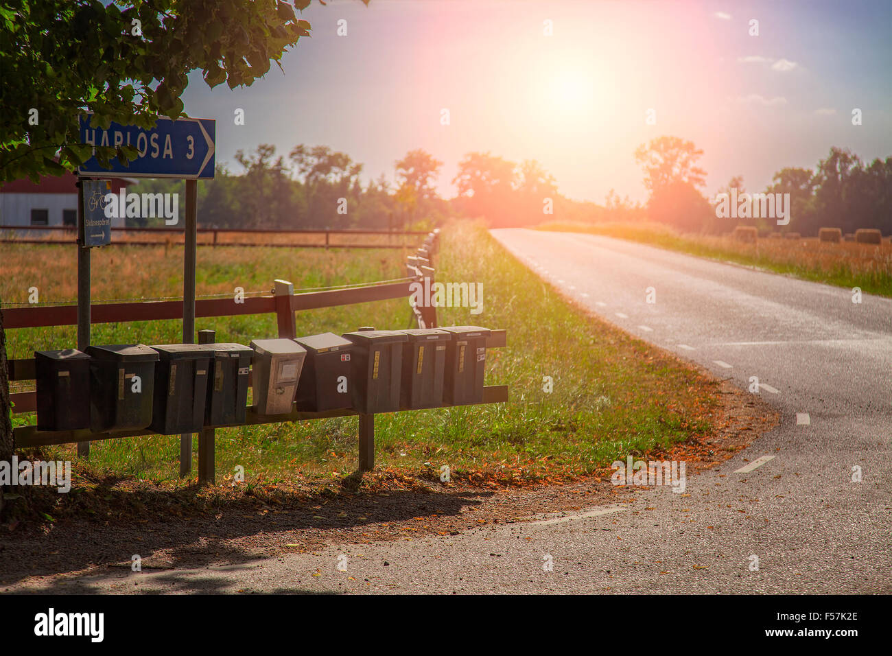 Image of old postboxes on a countryside road. South Sweden. Stock Photo
