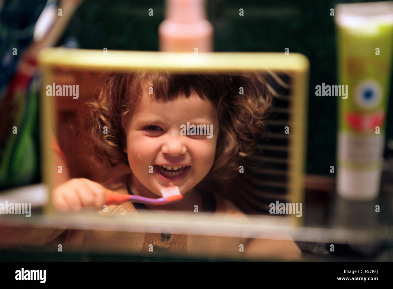 Little child brushing his teeth. Stock Photo