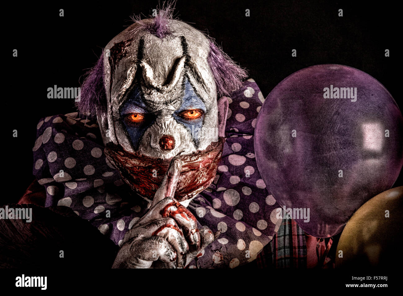 Scary creepy clown with Stock Photo
