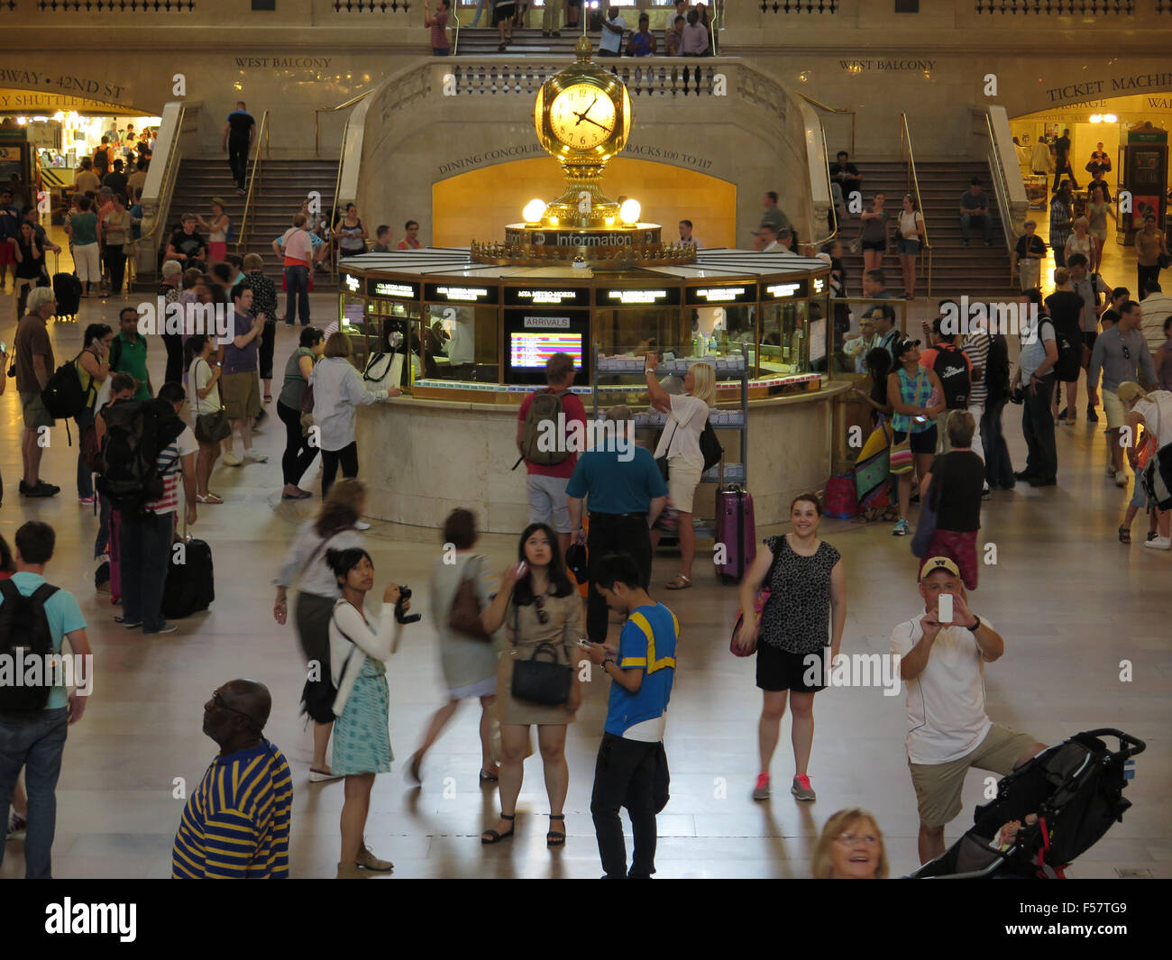 A busy Grand Central Station in New York City's afternoon rush, information booth in center. Stock Photo