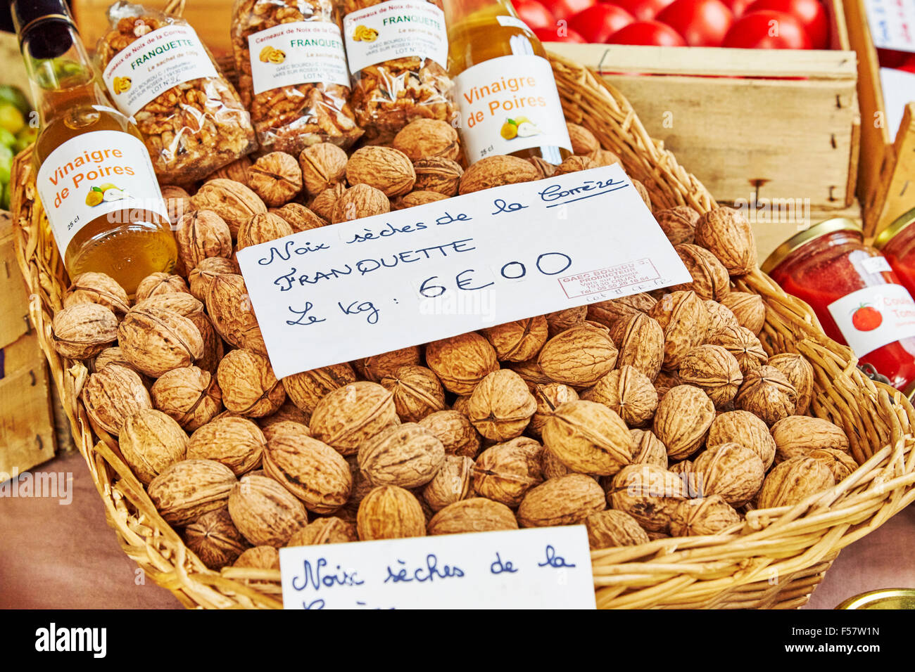 walnuts for sale on a street market stall in Objat, France. Stock Photo