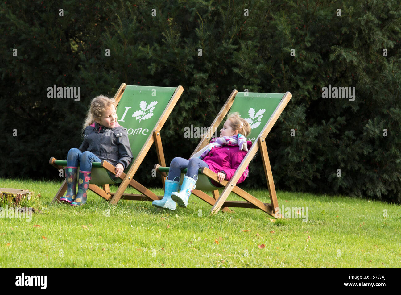 Two young girls playing at Croome Park, Worcestershire, England, UK Stock Photo