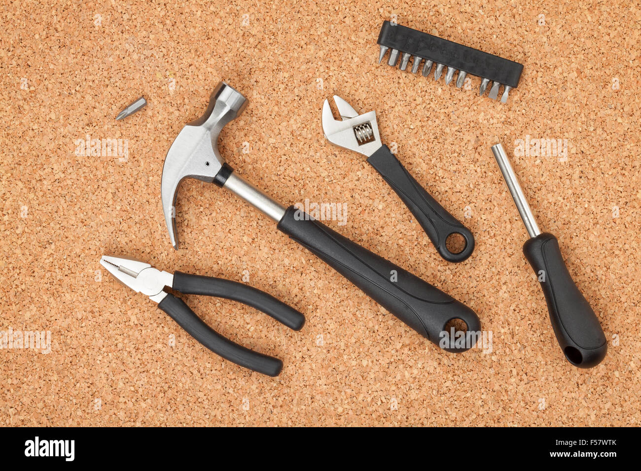 Set of tools on cork panel background Stock Photo Alamy