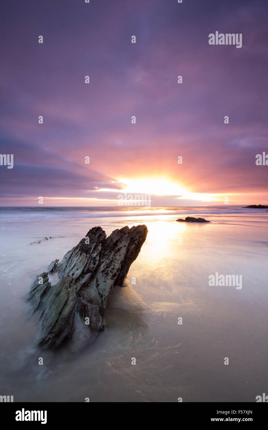 Sunset and receding tide at  Freathy Beach Whitsand Bay Cornwall UK Stock Photo