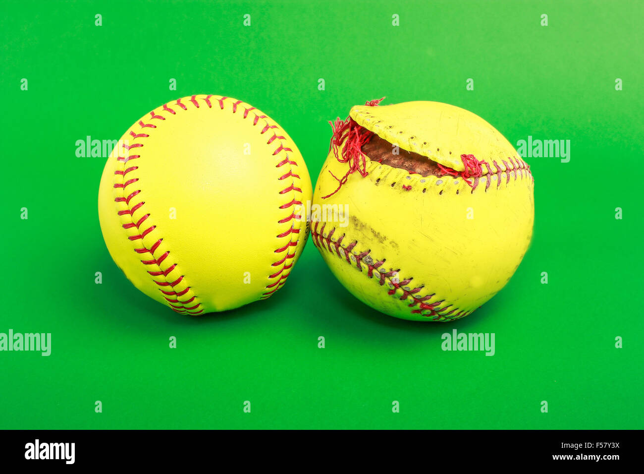 softball ball isolated on green background Stock Photo Alamy