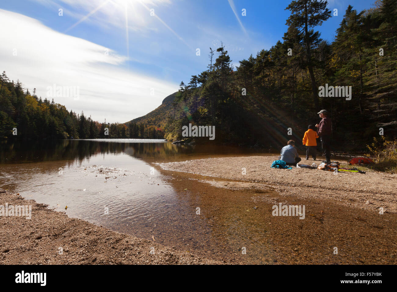 A family on the shores of Greeley Ponds on the Kancamagus Highway, White Mountains, New Hampshire New England USA Stock Photo