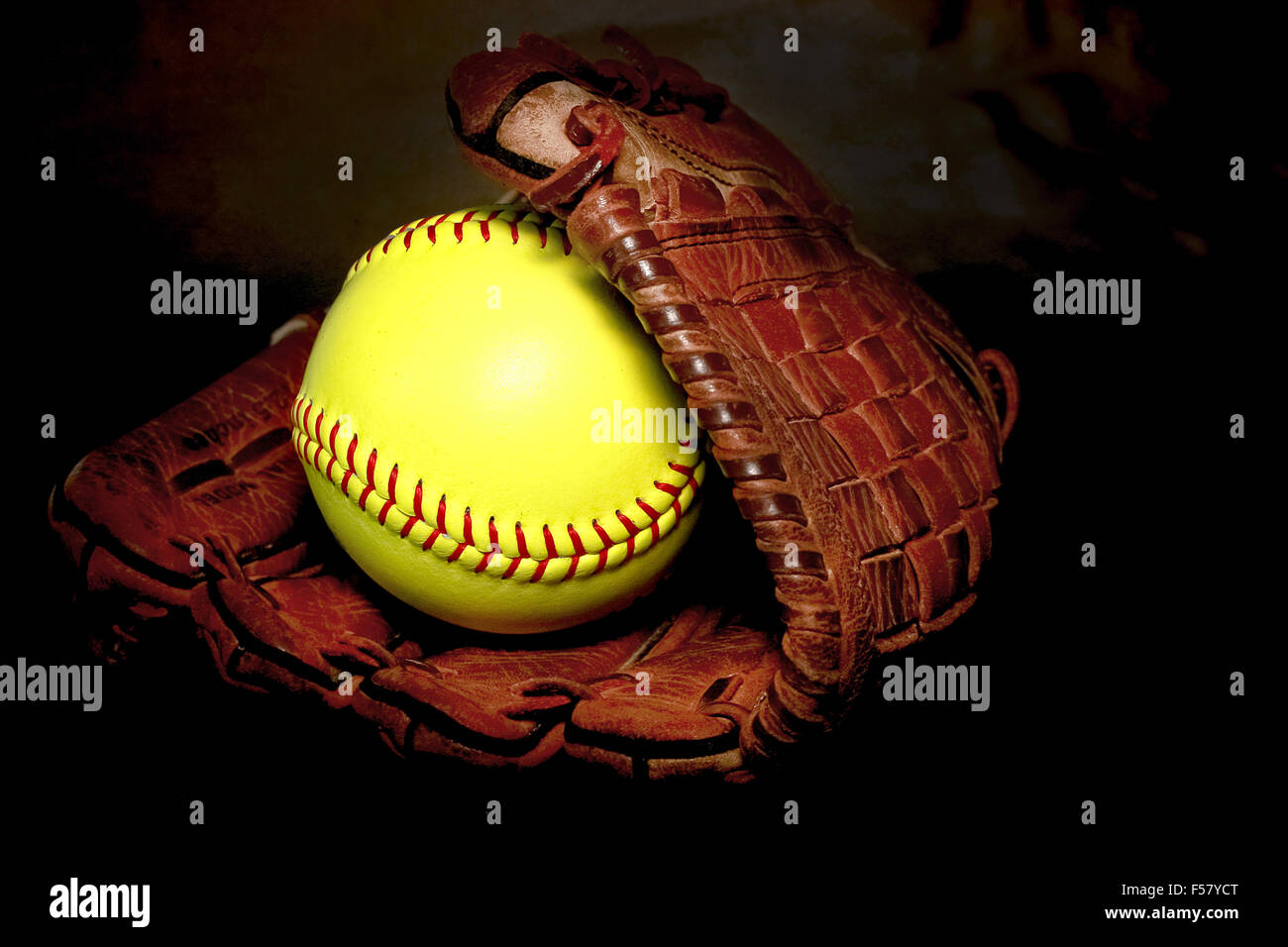 Closeup of a Softball Glove and ball Stock Photo Alamy