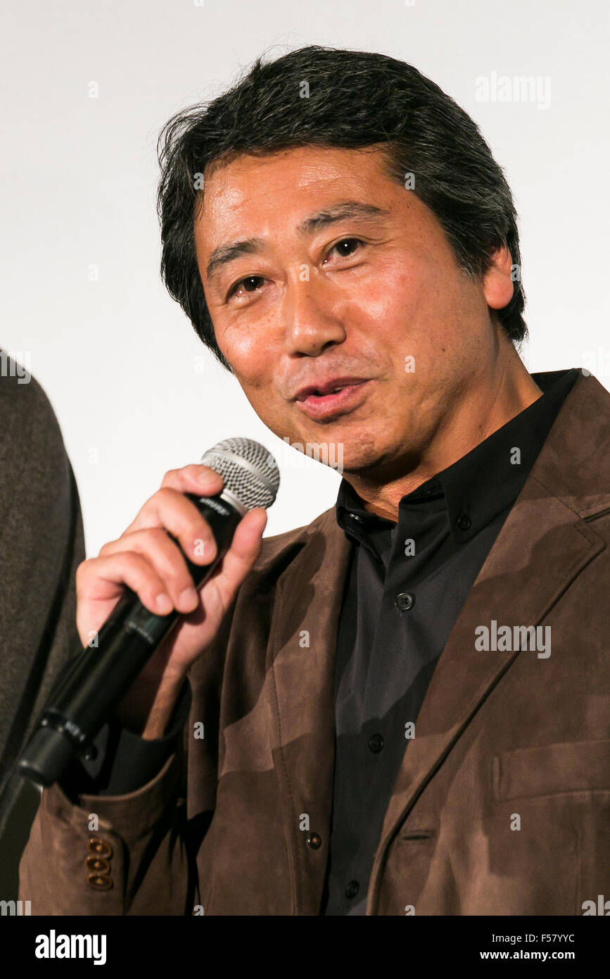 Director Taiichi Sugiyama speaks during a stage greeting for the movie ...