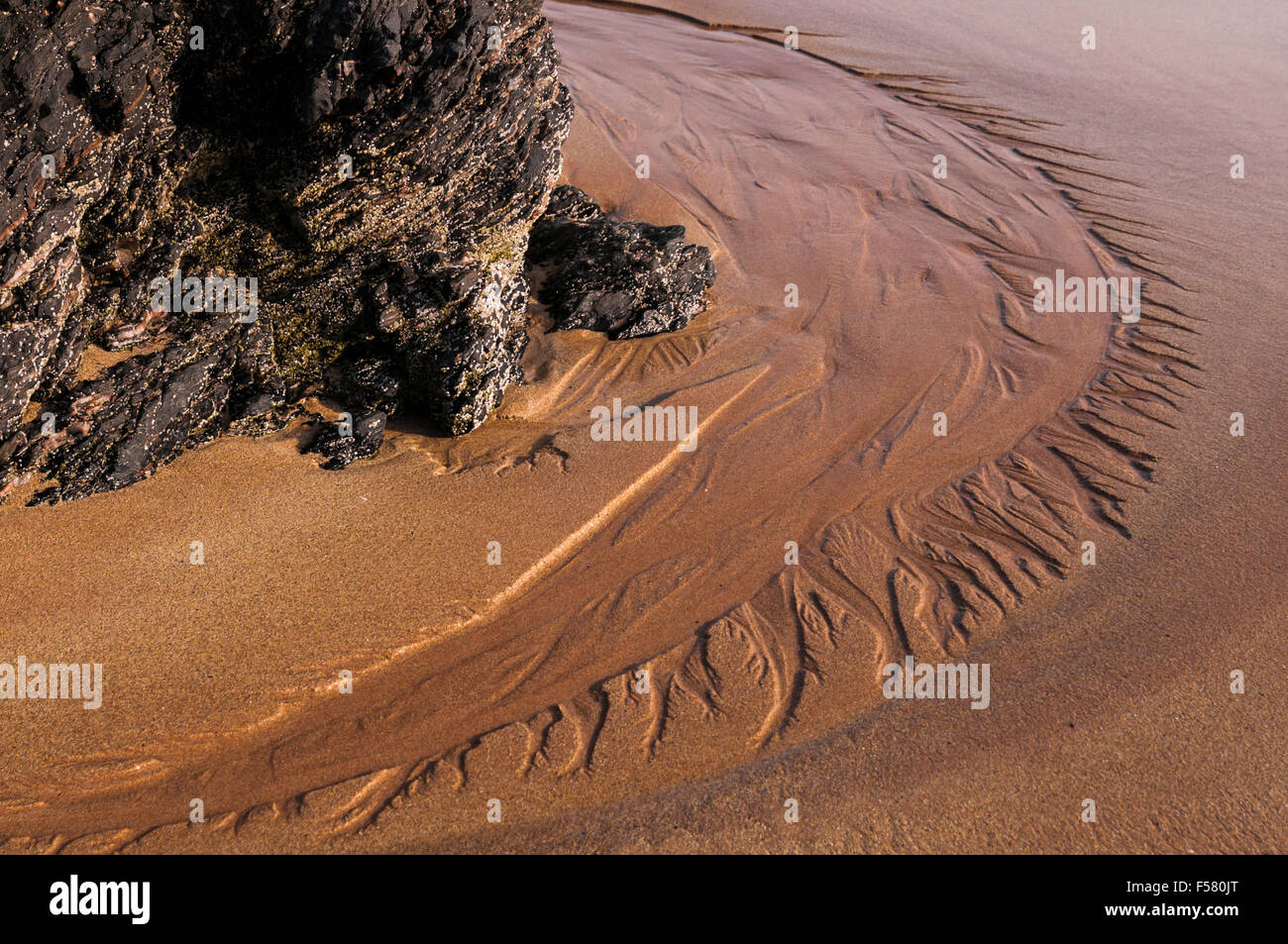 Patterns in the sand left by the falling tide on the beach at Sango Bay, Durness, Sutherland, Scotland Stock Photo