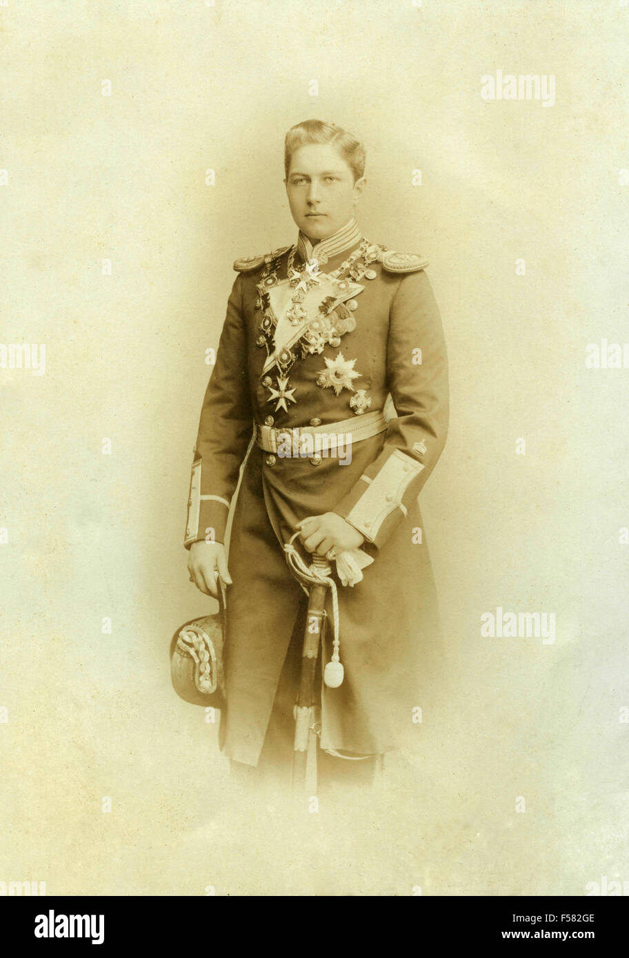 A highly decorated soldier in full uniform Stock Photo