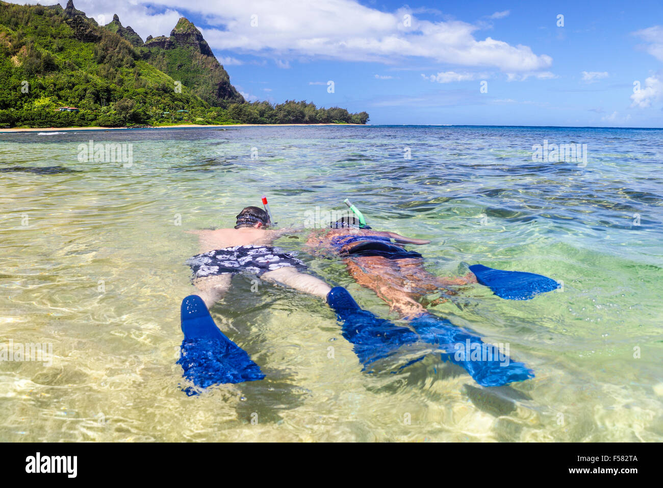 Snorkelers at Tunnels Beach on Kauai Stock Photo Alamy