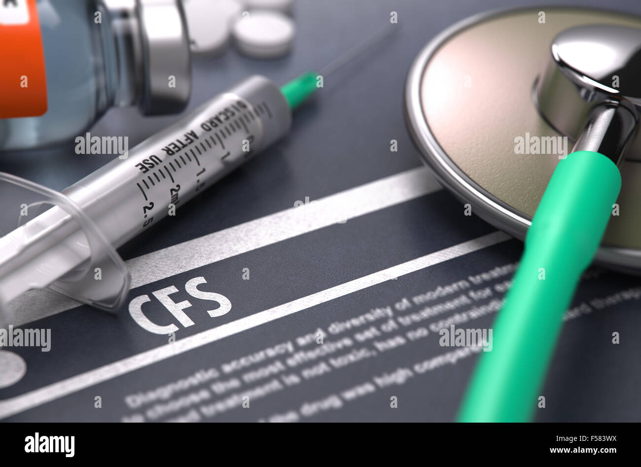 Diagnosis - CFS. Medical Concept with Blurred Text, Stethoscope, Pills and Syringe on Grey Background. Selective Focus. Stock Photo